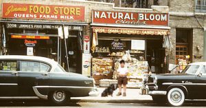 A story about family. Pictured Ira with Blackie in front of dad's candy store.