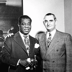 Joe Glazer, here with Louis Armstrong in the best music autobiography.